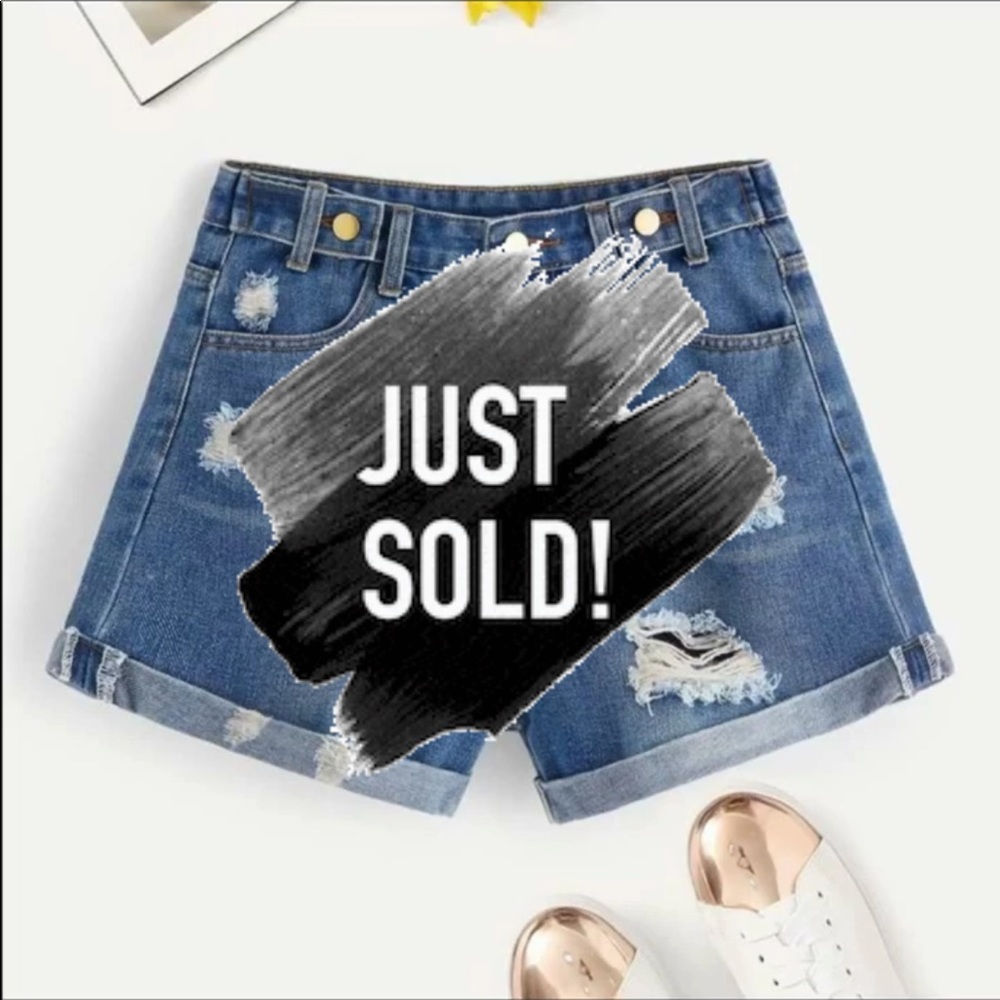 Distressed medium washed jeans